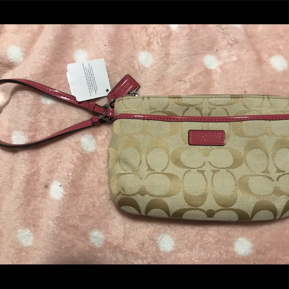 Classy, brand new, flawless coach wristlet